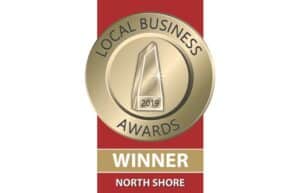 Showing the 2019 Local Business Awards Winner medal for North Shore with a gold award emblem on a red ribbon.